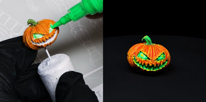 Pumpkin painted with fluorescent paints and refillable markers